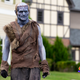Frankenstein's monster roams a suburban street in a scene from Shudder's Creepshow series.